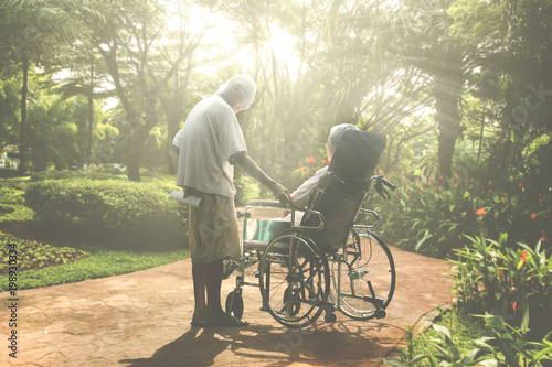 Elderly woman relaxing with her husband photo