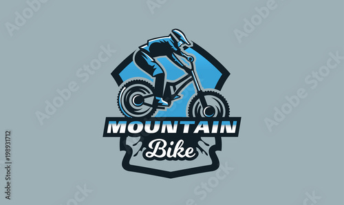 Colorful emblem, badge, logo of a rider on a mountain bike. Bicycle, transport, downhill, freeride, extreme, sports. T-shirt printing, vector illustration.