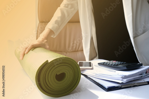 young asian woman work in office balance life.yoga