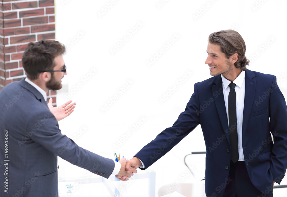 welcome and handshake of business partners welcome and handshake of business partners