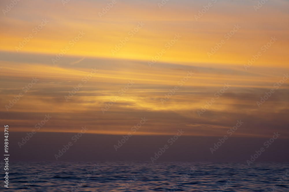 Livingston Island Antarctica, golden sunset over water