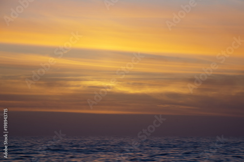Livingston Island Antarctica, golden sunset over water © KarinD