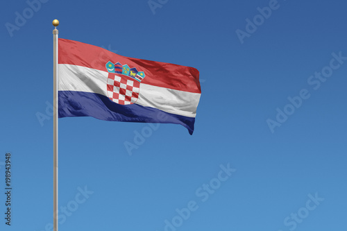 Flag of Croatia in front of a clear blue sky