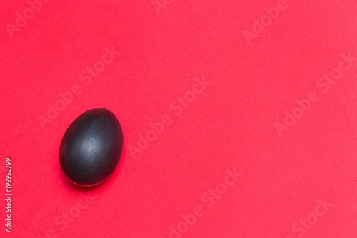 Black egg on the background photo