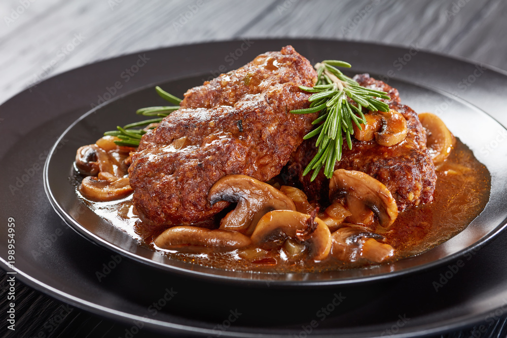 close-up of portion salisbury beef steaks close-up of portion salisbury beef steaks