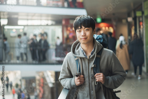 Young man traveling in Korea, Seoul Street photo