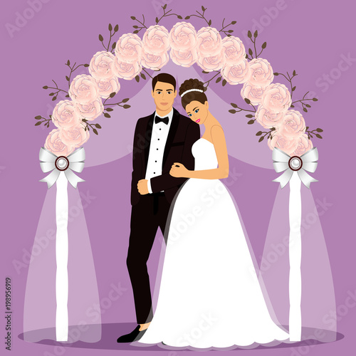 Wedding arch with bride and groom. 