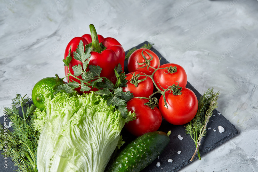 Delicious composition of assorted fresh vegetables and herbs on white textured background, top view, selective focus. Delicious composition of assorted fresh vegetables and herbs on white textured background, top view, selective focus.