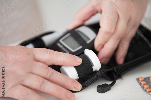 An apparatus that measures glucose in the blood.