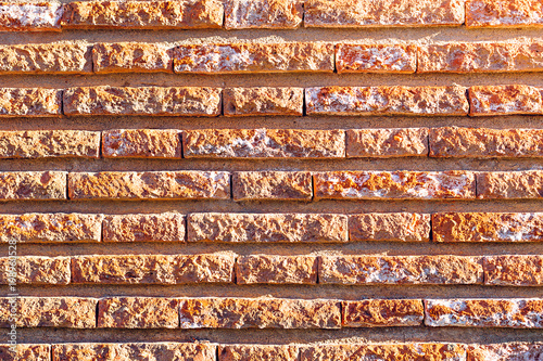 Various length brick wall background. Barcelona, Spain.