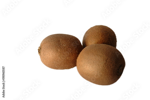 Tree fresh kiwi fruits on a white background  isolated  close up. 