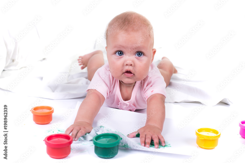 Colorful painted hands in a beautiful young girl. isolated on white background Colorful painted hands in a beautiful young girl. isolated on white background