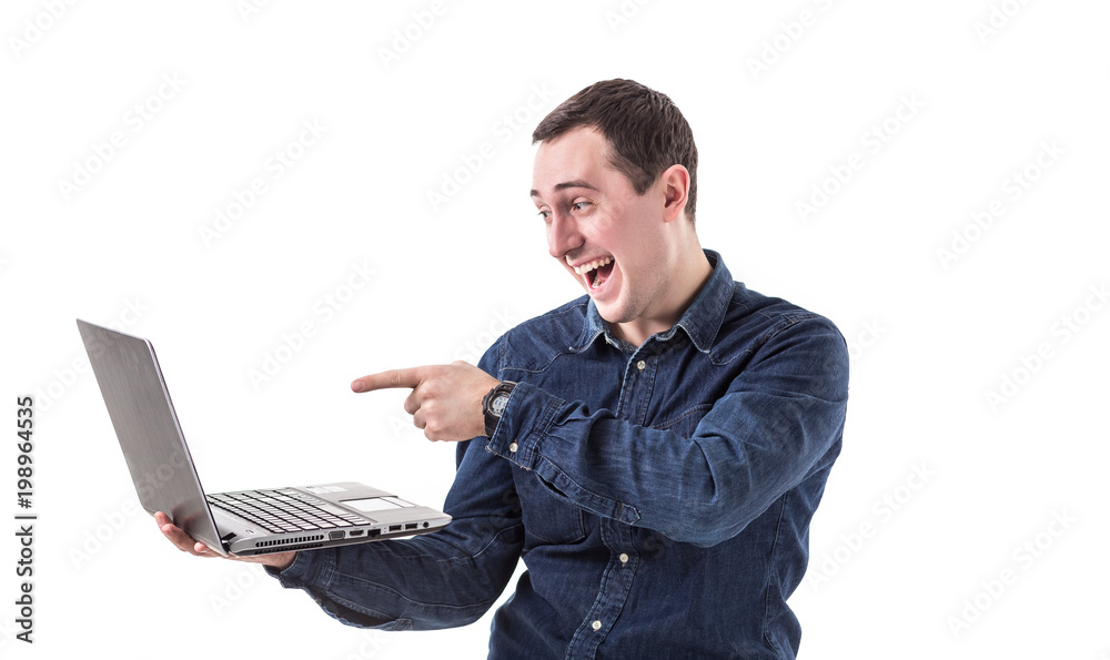young programmer (man) holding a laptop in hands and talking on skype with friends isolated on white background. Copy space young programmer (man) holding a laptop in hands and talking on skype with friends isolated on white background. Copy space