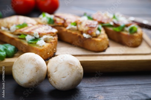 Champignons over food background, delicious mushroom recipe