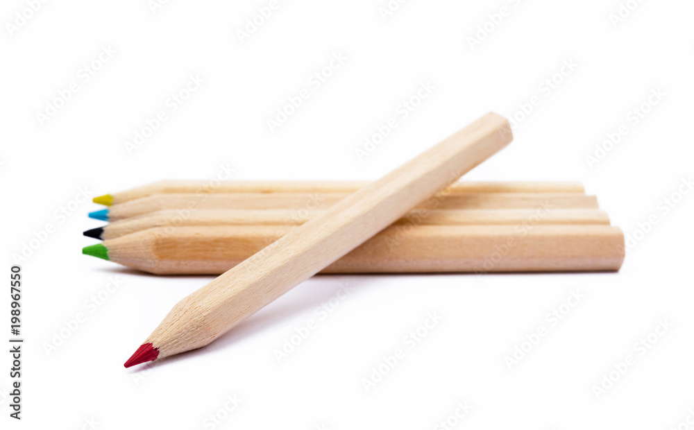 Obraz premium Wooden colorful ordinary pencils isolated on a white background