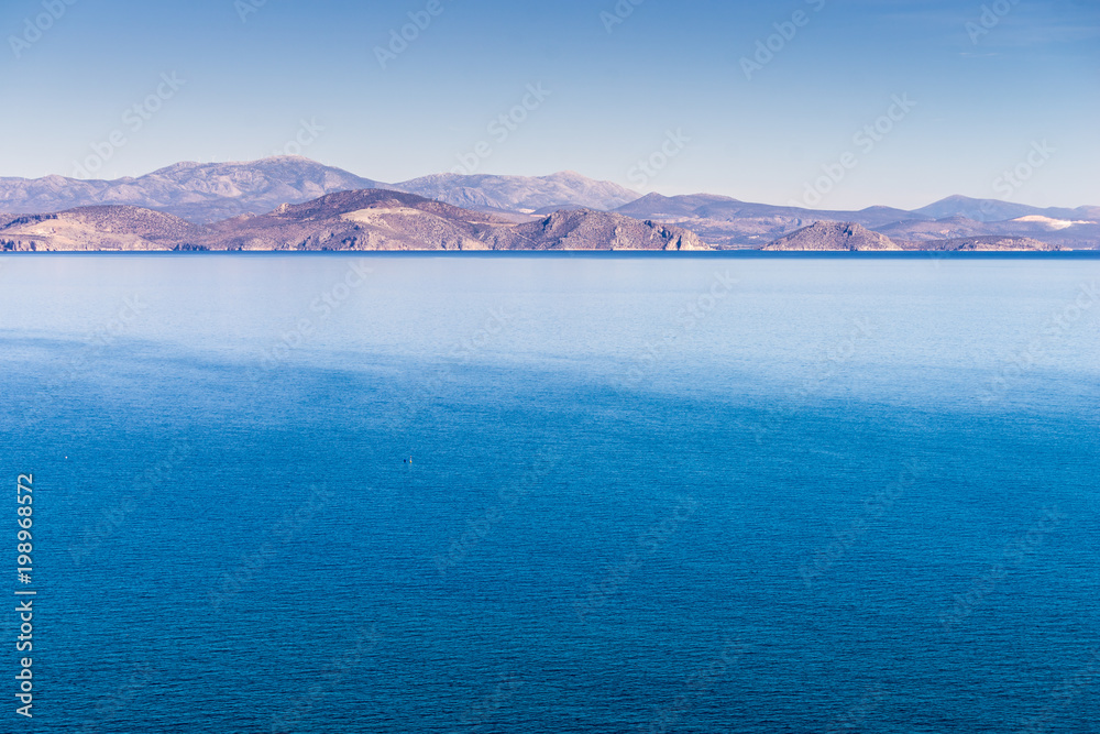 Greek coastline on sunny day
