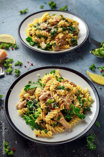 Homemade Pasta fusilli with Chicken, Green Kale, Garlic, lemon and parmesan cheese. healthy home food
