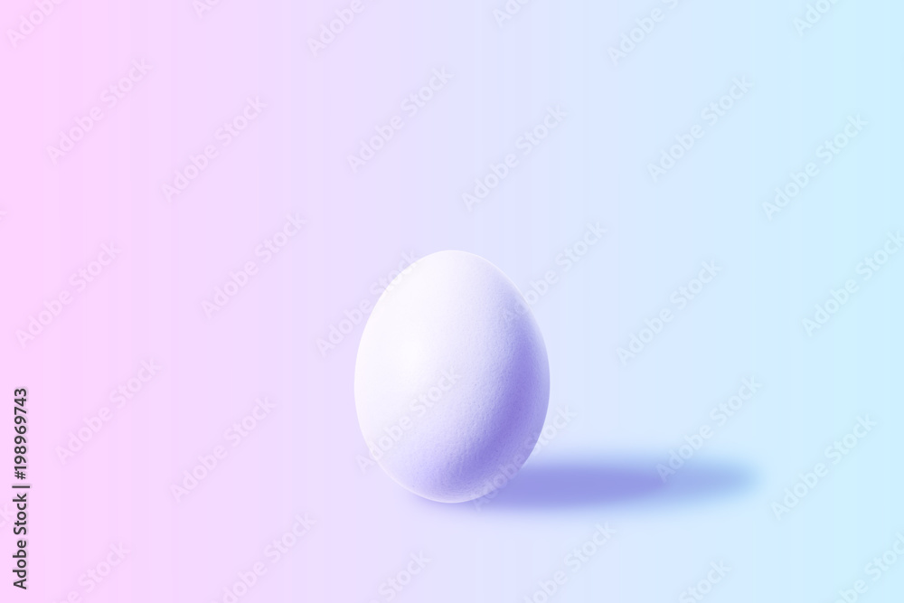 White Easter egg with colorful ultraviolet neon lights. Creative concept. White Easter egg with colorful ultraviolet neon lights. Creative concept.
