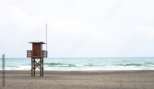 lifeguard tower on a beach.