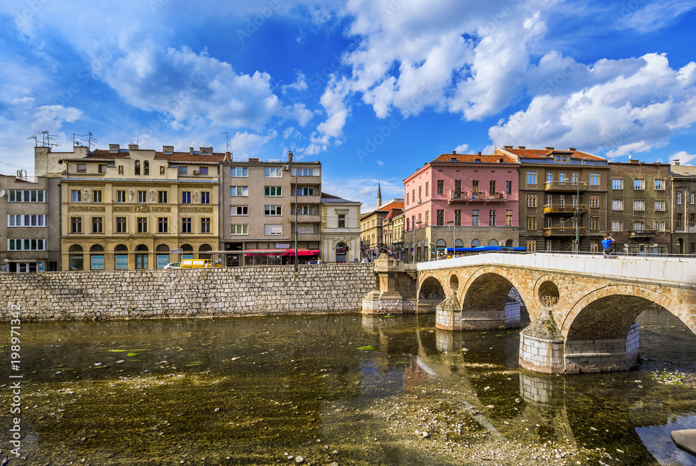 Fototapeta premium View of Latin Bridge with town in background at Sarajevo