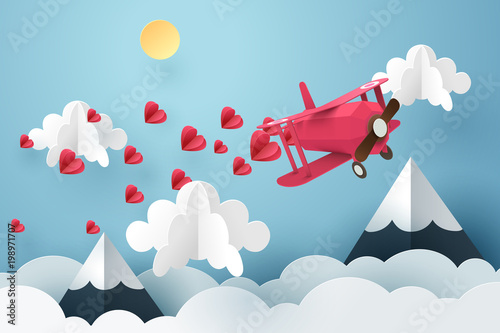 Paper art of pink air plane flying and scatter heart in the sky
