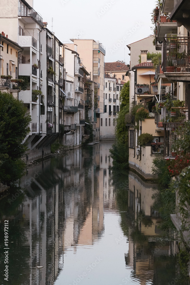Padova, Italy - August 24, 2017: - Buildings facing the river in Padova downtown.