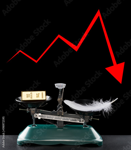 gold bar lighter than a feather with removeable arrow on black concept of gold worthless