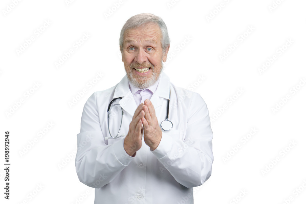 Portrait of old doctor is applauding. Shocked senior physician. White isolated background.
