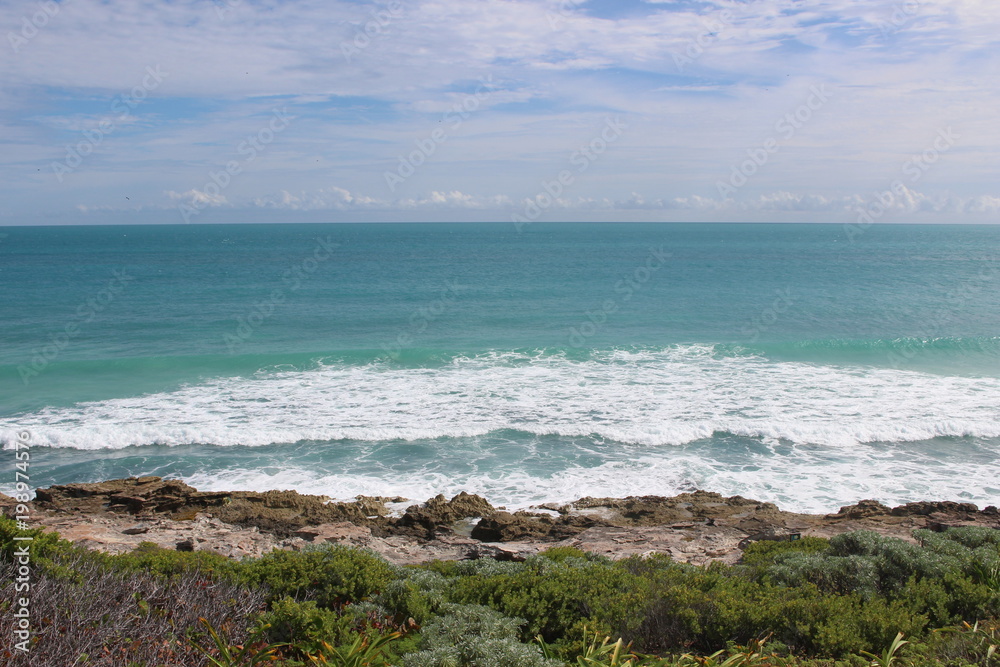Foaming waves near the coast of the island/ Island Contoy, Mexico Foaming waves near the coast of the island/ Island Contoy, Mexico