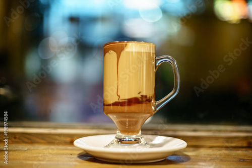 Americano Caffe with wooden background