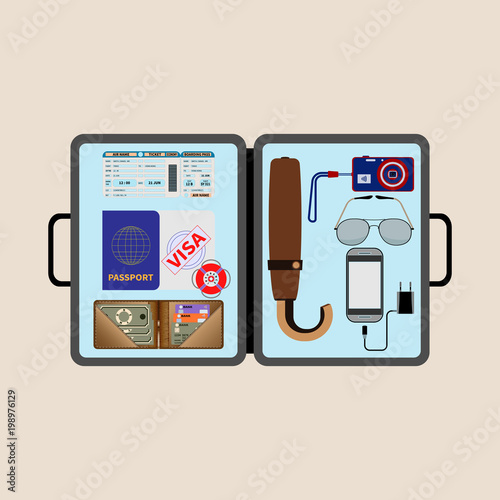 Necessary things for travel in an open briefcase on a light background. Top view. Vector flat design.