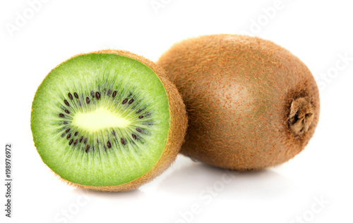 one solid and one half of ripe kiwi isolated on white background