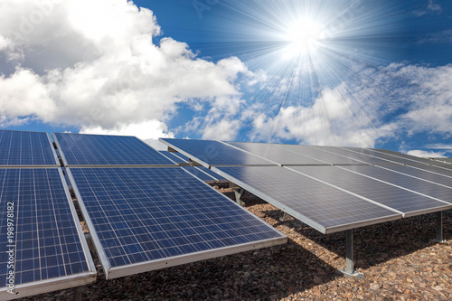 solar cell panel with strong sun and sky