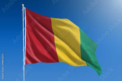 Guinea flag and blue sky