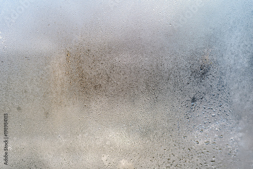 Abstract texture of the misted glass with water drops