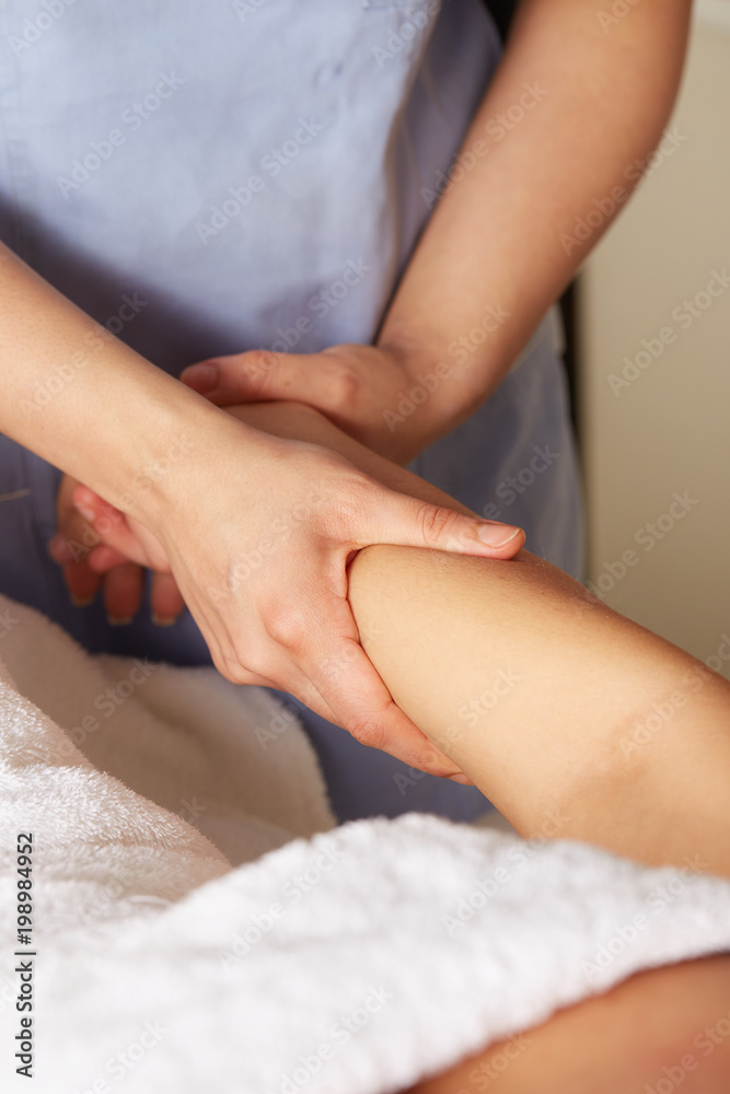 Fototapeta premium woman's hand massage in spa club