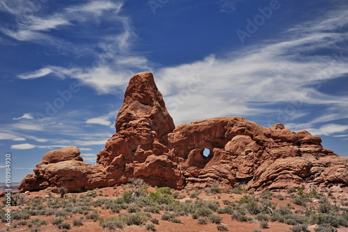 USA. Natural arch of red stone in Utah