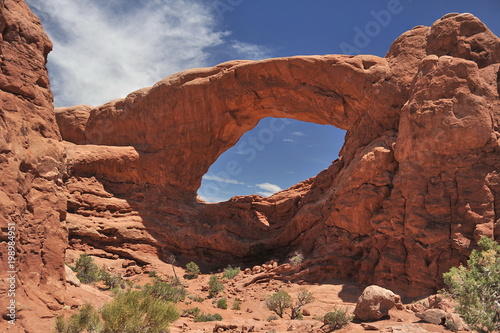 USA. Natural arch of red stone in Utah