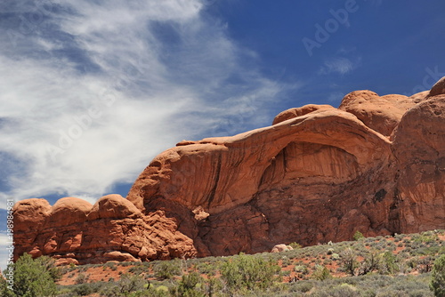 USA. Natural arch of red stone in Utah