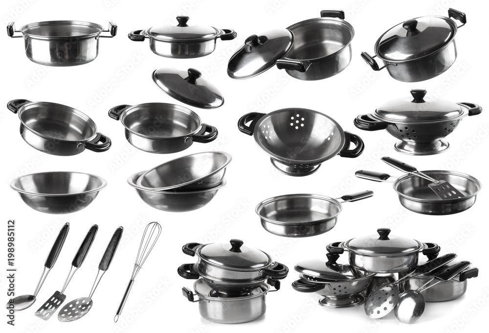 Collection of stainless steel pot with kitchen tool set. Spatula, Whisk, Ladle isolated on white background Collection of stainless steel pot with kitchen tool set. Spatula, Whisk, Ladle isolated on white background