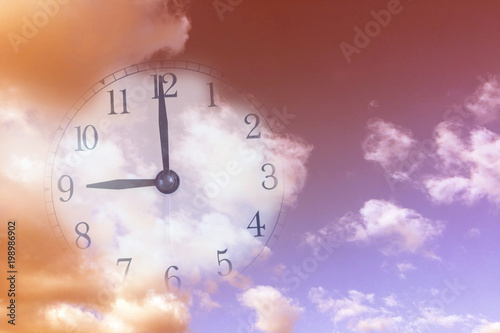 Clock with sky and cloud. Vintage style background.