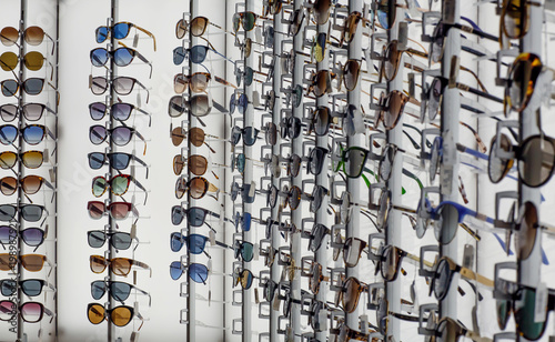 Various of sun glasses in the shop display shelves