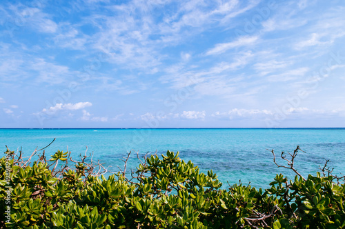 crystal clear turquoise water at Ikema Bridge, Miyako, Okinawa photo