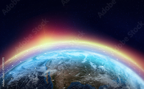 Global network across the planet. The earth is surrounded by a web of digital data. Elements of this image furnished by NASA photo