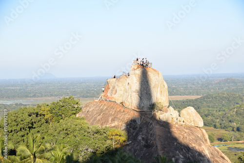 Shadow of stupa on Mihintale Rock, Sri Lanka photo