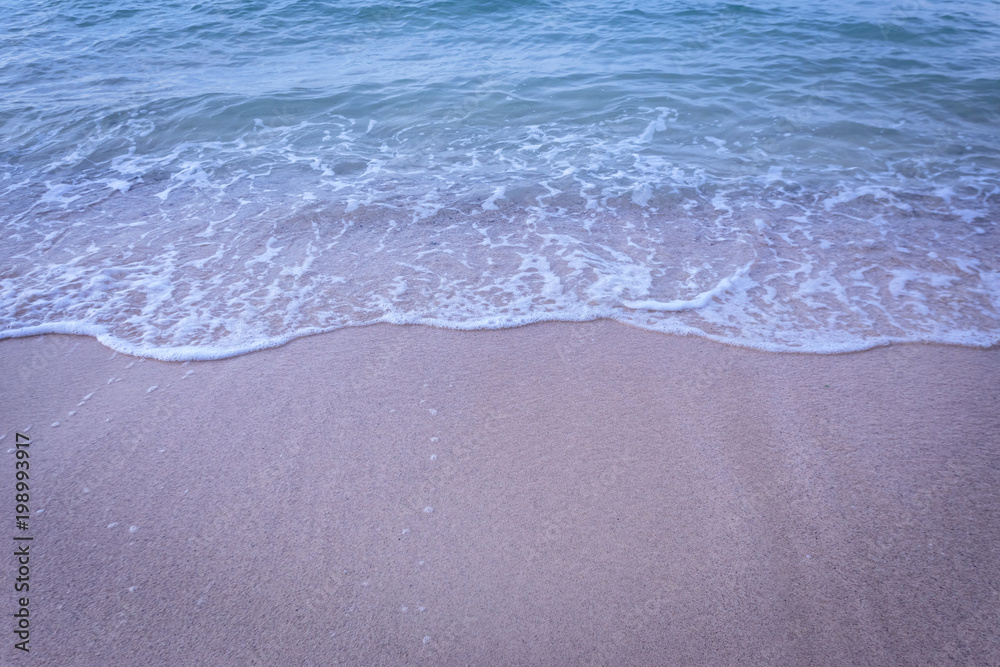 Small waves lapped the beach