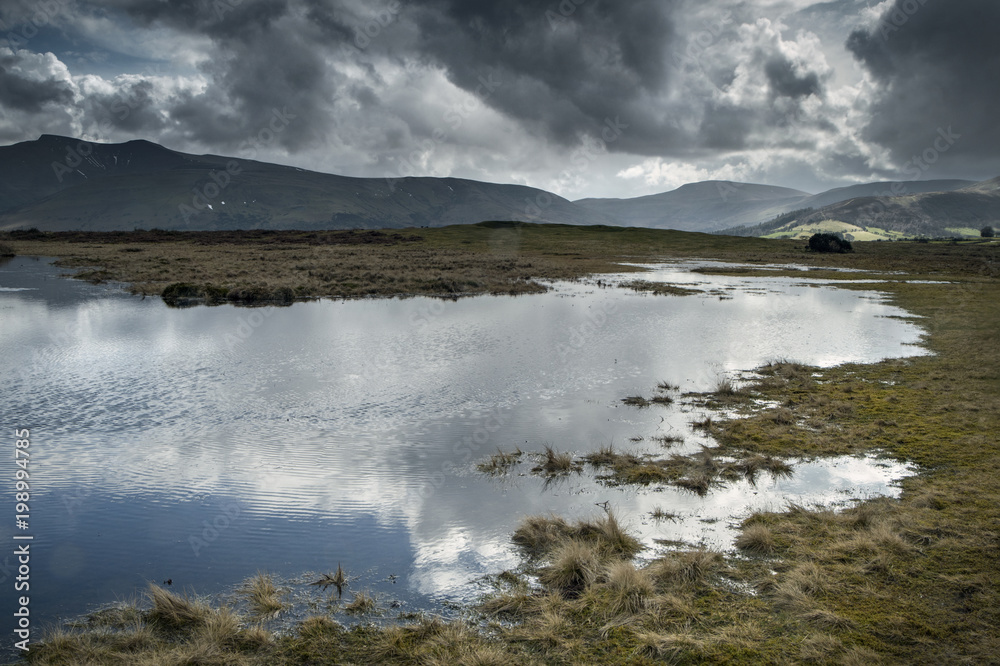 Winter overcast hills and mountain landscape Winter overcast hills and mountain landscape