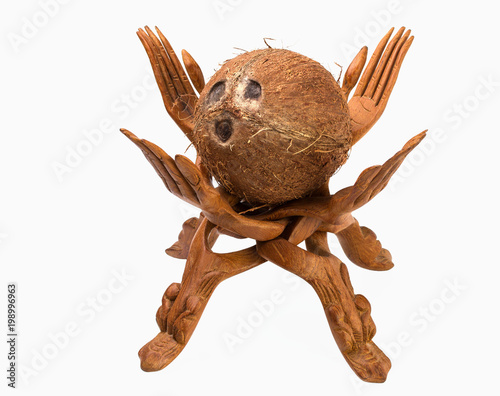 Wooden vase, in the form of bound four hands, with coconut