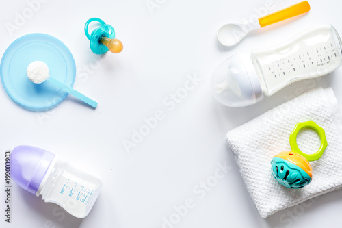 preparation of mixture baby feeding on white background top view