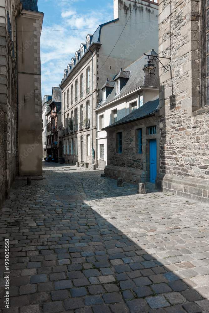Fototapeta premium Cobblestone alley, Brittany, France, Europe